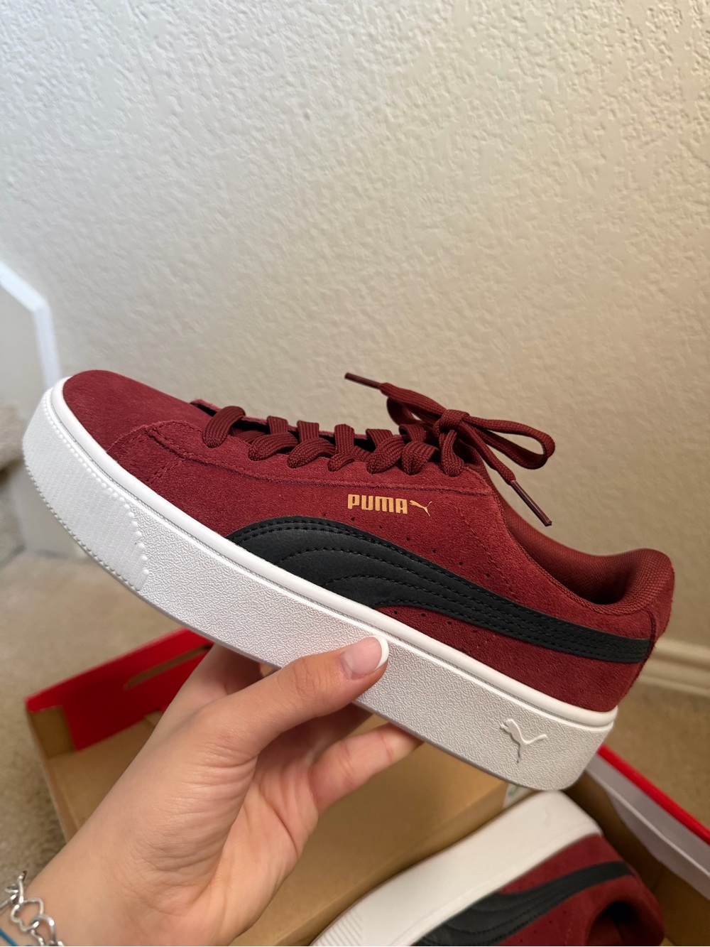 Puma Women’s Suede Sneaker in Burgundy with Black Stripe